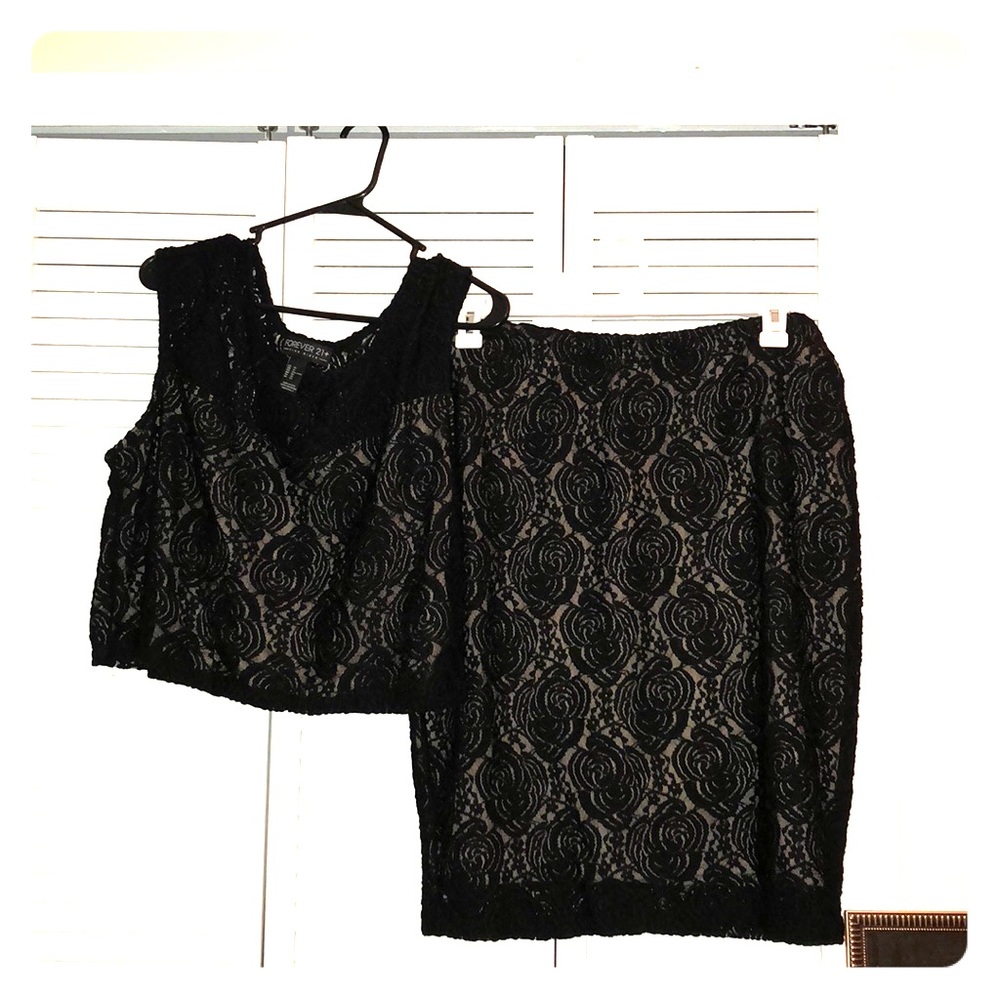 Skirt / shirt outfit.